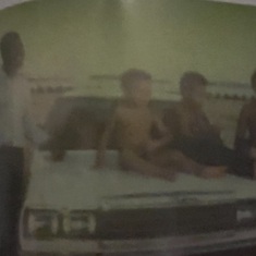 Daddy,and his children at the Bar beach.

Lagos Nigeria, early 1980's