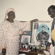 Daddy and his sister Mrs Arinola Olumodeji flanking a picture of their father Daniel Ubini Oshodi.