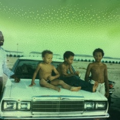 Daddy with his three sons Ade, Olu and Dele at the Bar beach.

Lagos 1981