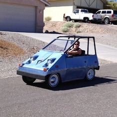 Greg driving Earl's electric car