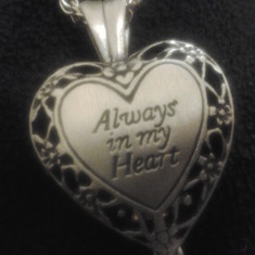 A special locket with a piece of his loc inside