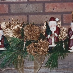 Some of Ed's Santa's that he carved