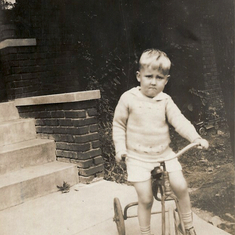 On his tricycle about 1930