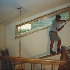 Ed fixing window at Forked River, NJ home