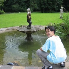 2003 St. Martin, Austria, Schloss Grubhof garden. A mischievous boy in the royal garden!