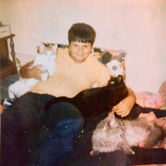 Edward with our three cats mid sixties ... L to r; Ding, Fluffy and Sneezey.