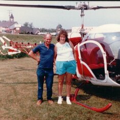 Eddie and me. smokey mountains. you could not get in a plane, but agreed to go up in a Helacopter. he enjoy every min. I will never go back on 1.I was so happy to feel the ground under my feet......lol