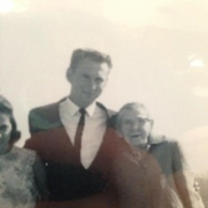 Eddie, standing with his Mom on the right and Barbara, on left