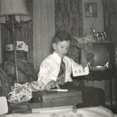 Ed opening presents (Christmas 1952)