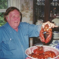 Ed fighting a lobster at my brother's Maine house 