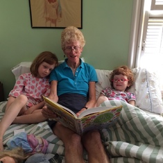 Reading to Olive and Lucy as she and they loved to do. Aug 14 2017 , San Pasqual St., Pasadena 
