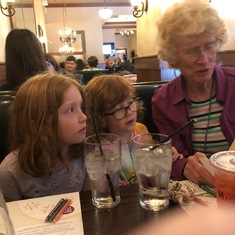 one of the last pix of Edwenna at dinner with Olive and Lucy .