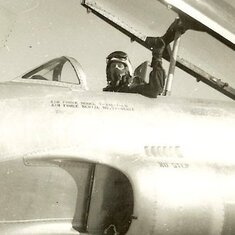 1950 or 60's Edwin Dodds in Plane with helmet on and top raised