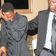 My Son Peter comforted by Bishop Aryee 2015
