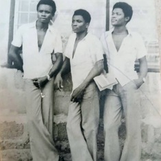 Surveyor Ekpenyong with friends during his time in the university