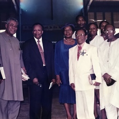 Dad with close friends, relatives and kids in church in Enugu in the early 2000s
