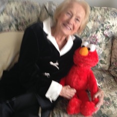 She loved her Elmo. He would talk to her and when he fell asleep he snored and she would laugh every time.