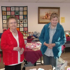 Mom and Nancy Doing a Grandma's Attic fundraiser
