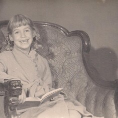 Reading in Grandfather chair, Dallas, TX  1952