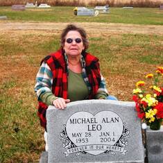 Mom at Macky Leo's grave in Piedmont, Kansas. My mom and Mac were extremely close. Mac died in January 2004 and my mom missed him dearly. He was definently one of the many things that made her so sad in the end.