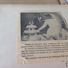 A cut -out article from the newspaper reporting the wedding event.