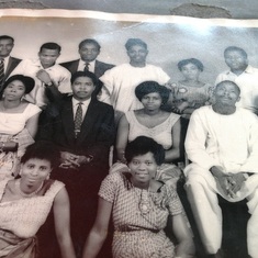 Daddy 3rd from left visiting his cousin De Silas Standing behind Da Bernice his wife who is sitting left of Daddy in Calabar.