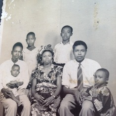 Sitting from R-L, Daddy holding Iheanyi, Da Martha, Uncle Jerry holding Okey. Standing from R- Uncle Sam
