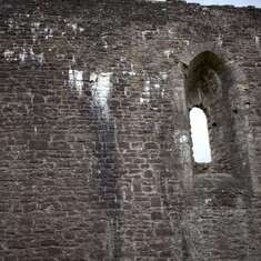 At the Monty Python castle,  mimi and john chilling while i ran around the ramparts