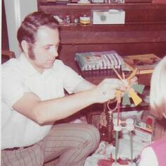 Playing with Kevin's new Tinkertoys - Christmas 1972