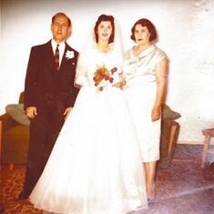 Elma with her mother and father, Mary and Arsen Galoostiantz, on her wedding day.