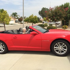 Elyse whopping it up in the convertible Camero Karen rented while visiting for Heather's wedding.  2014.