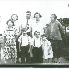 Orr Family- left to right, back row: Uncle Clyde, Aunt Clara, Grandpa and Grandma Orr, Great Grandma Mary.  Bottom row, left to right: Aunt Ilene, Uncle Vern, Uncle Ralph, mom