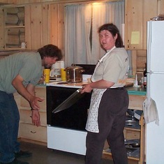 Don & Em cooking for the family at the cabin 6/04