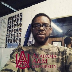 Dad at his barbershop, He loves Alabama A&M Bulldogs