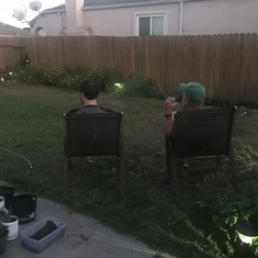 Eric and Dad chilling in the backyard.