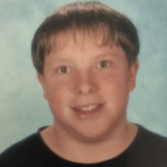 School picture when he was 15.