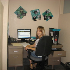 Erika at her desk in A.J.