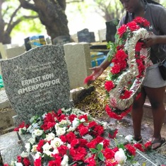 Selassie laying wreath on her dad’s grave