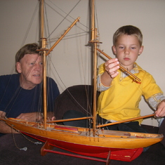 Mark and Grandpa learning about Ernie's special boat