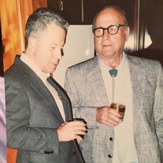 Grandpa sharing most likley scotch with Russ (Colonel R.E. Honsowetz)