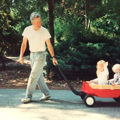 Grandpa taking Matt & Savannah on a tour of the neighborhood