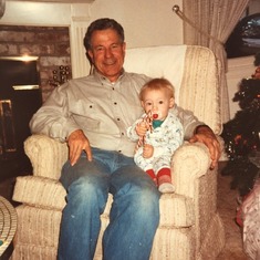 Grandpa holding Matthew on Christmas morning