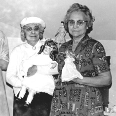 Viola and Dorothy with one of their collectible dolls
