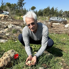 Viktor is planting trees for Eugene in Israel, February 2024