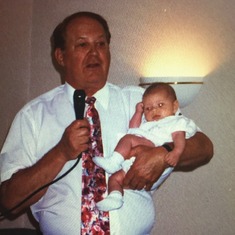 My father doing a speech at Pinecrest, This is Madison. Dad threw a party after her Christening