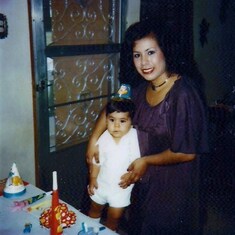 Juny and Mom ready for a party! Juny had his eyes set on something else....Food? Cake?