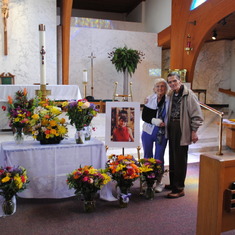 Grandma and Grandpa with your many flowers and you at church.