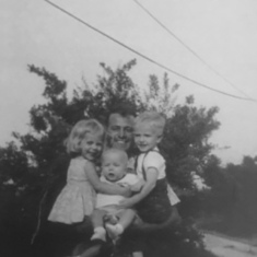 Grandpa Wes Pepper with children Teresa Anne, John Wesley and nephew Clifford Pepper.