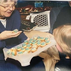 Grandma Evelyn having cupcakes with Gavin.