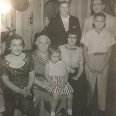 My mom with people she cherished her entire life. Her brother, John, his wife Lee, her nephew John Jr., her niece Nancy, her Mom, and my Dad. I was still a few years away